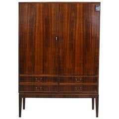 Superbe armoire danoise en palissandre:: moderne du milieu du siècle dernier