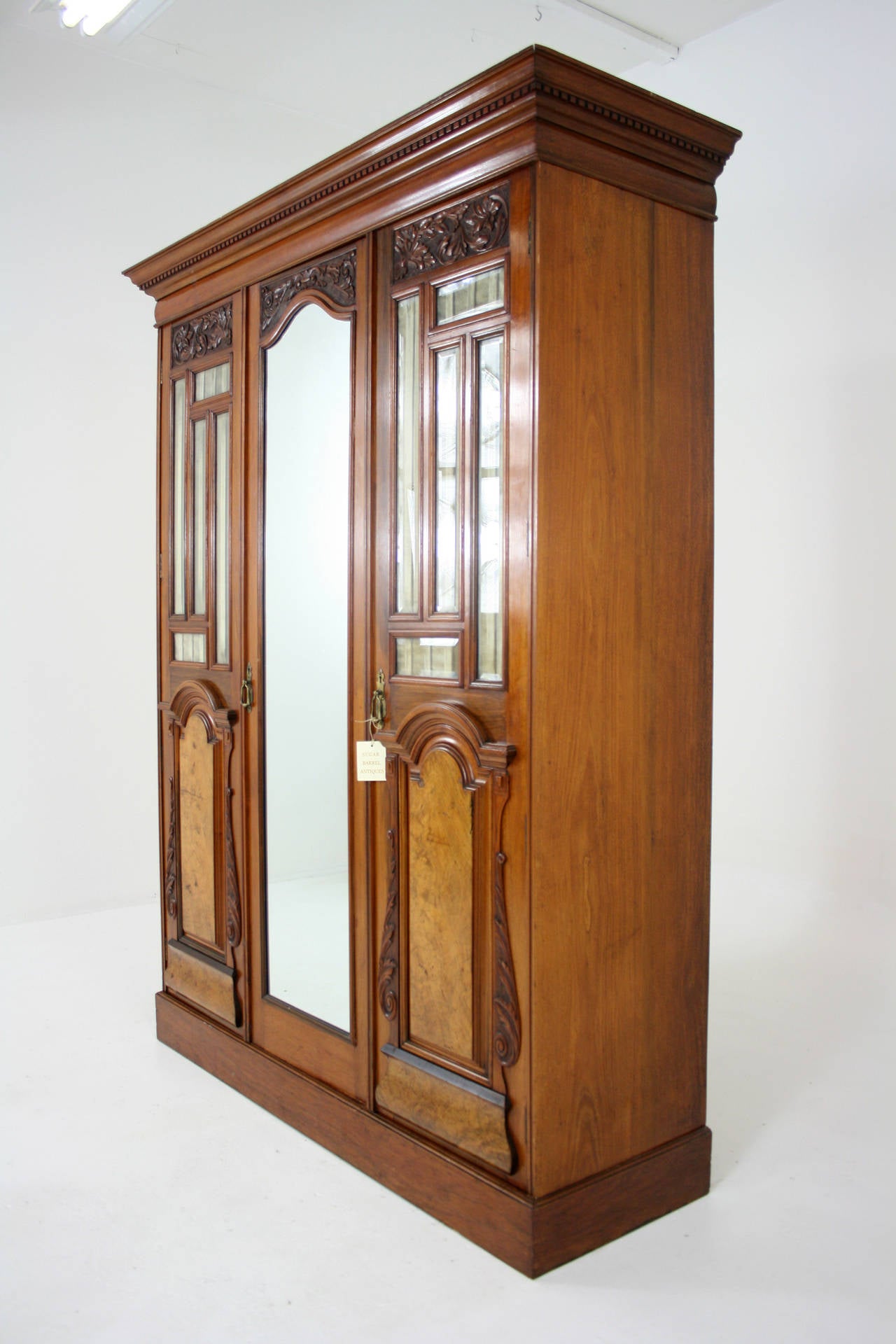 - Scotland, 1870
 - Victorian
 - Lovely solid walnut with burled walnut veneer
 - Bevelled glass doors
 - All original finish
 - Fitted interior
 - Original locks and hardware
 - Lovely warm patina
 - Separates into five pieces
 - 58.5″w x