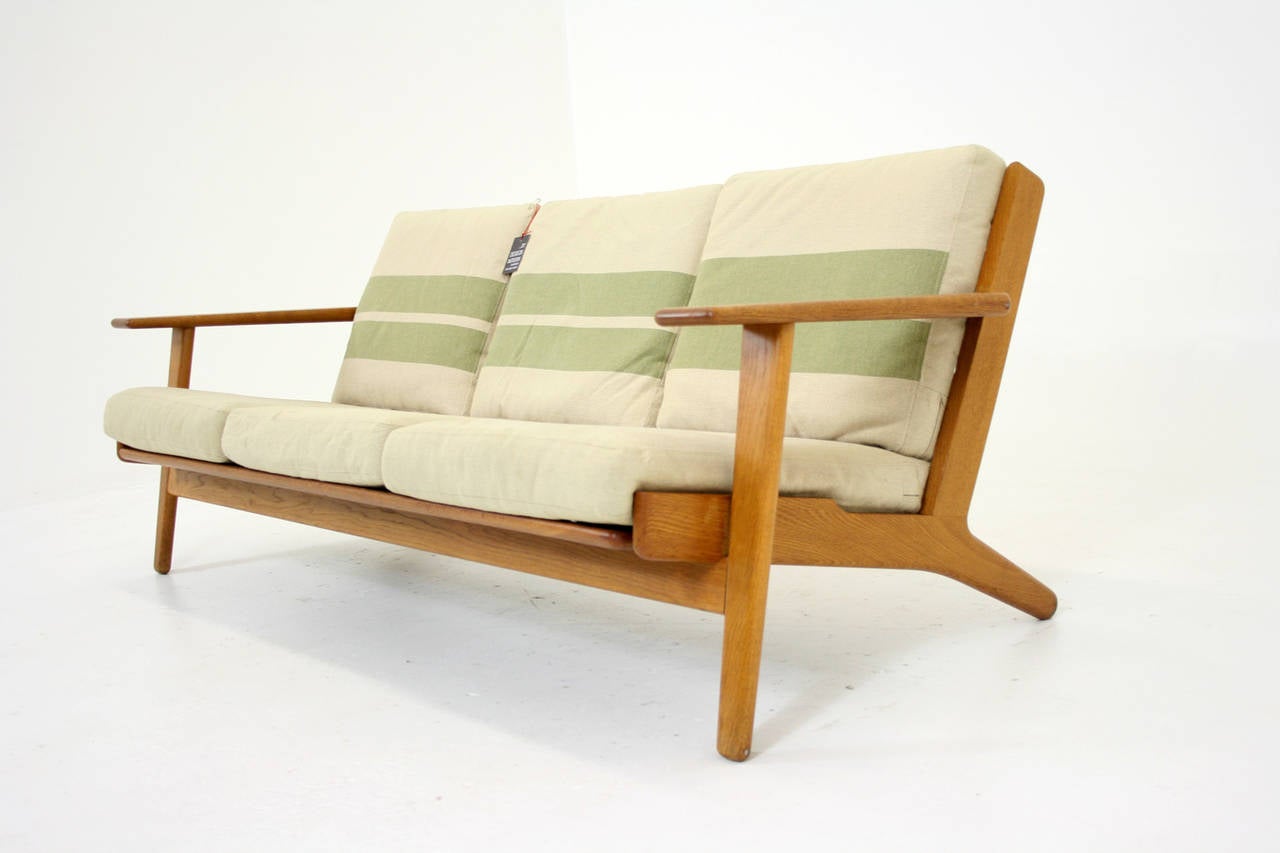 -$4895
-71.5″L x 32″D x 28.5″T
-Oak, GE 290 designed by Hans Wegner for Getama
-Showing original cushions with some staining
-Overall in excellent original vintage condition
-Shipping will be by blanket wrap home delivery
-SS# or Tax Id #