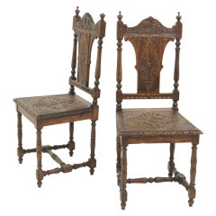 Pair of Heavily Carved Victorian Oak Hall Chairs