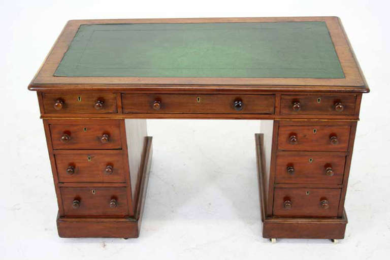 - Victorian
 - Circa 1880
 - Mahogany
 - 9 drawer desk
 - Turned wooden knobs
 - Original brass locks
 - Porcelain castors
 - Separates into 3 pieces for shipping
 - Item # 301-083
 - Shipping $285 by Greyhound