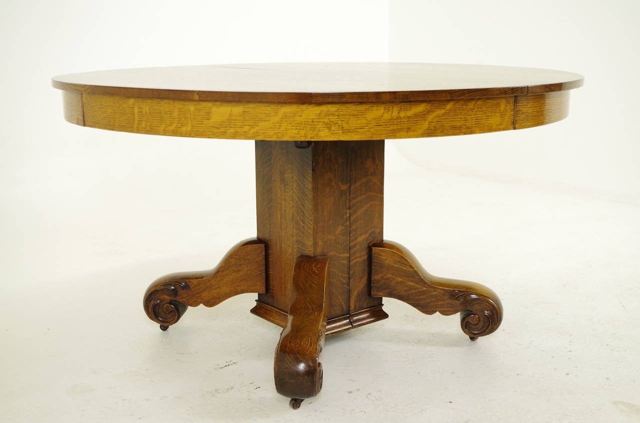 - $1850.00
 - American, 1910
 - Solid tiger oak, original finish
 - 4 original leaves (2 @ 9″, 2 @ 12″)
 - Large carved oak base
 - Some minor wear on top, leaves
 - 54″w x 30″h x 96″l (with all leaves)
 - Item
 - Shipping $550.00 by Plycon