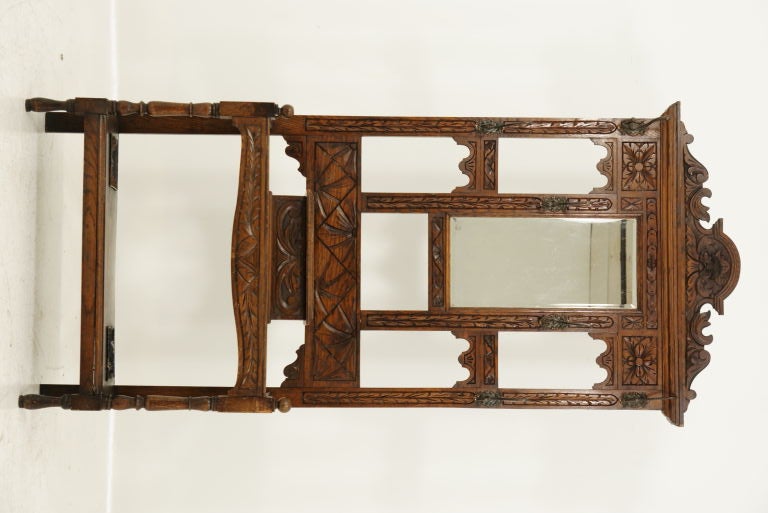 Victorian carved oak hall stand with bevelled mirror.  Lift top drawer with original hardware and metal trays.  Perfect for the front entrance of your home.  Lots of room for umbrellas, canes, etc.<br />
<br />
************** Important Customs