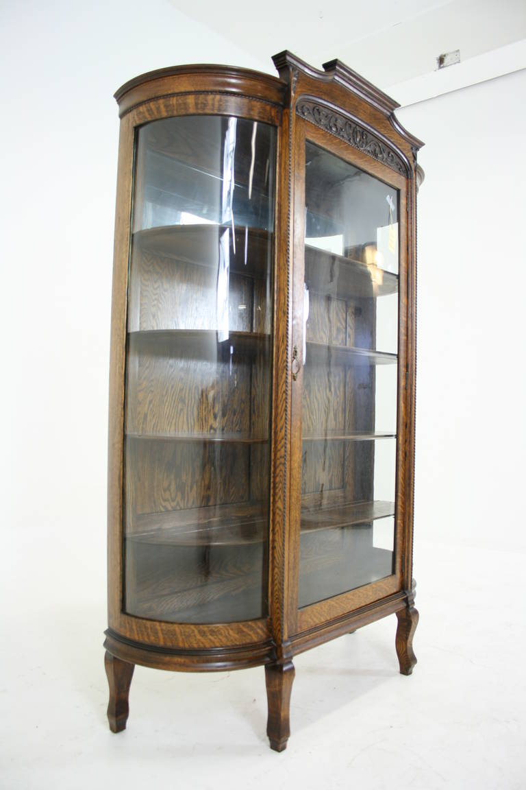 antique bow front curio cabinet