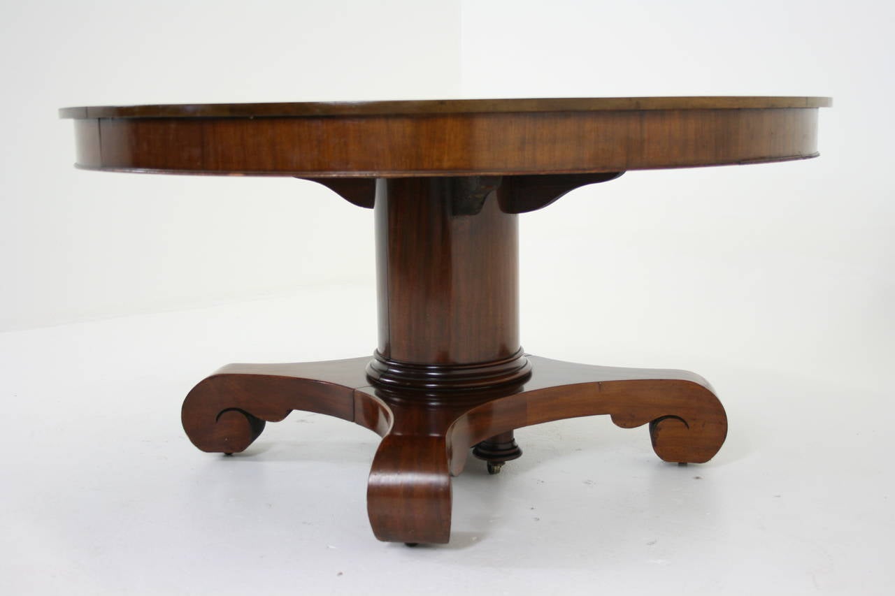 antique split pedestal dining table