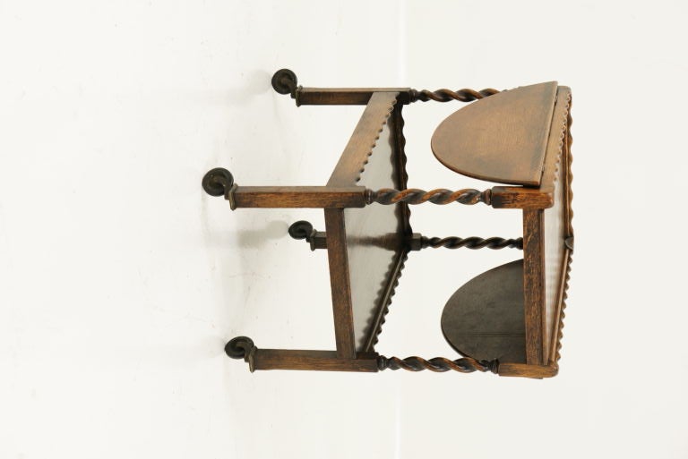 Solid oak barley twist tea cart with drop leaves, in original condition.  Please note: each of 2 leaves is 10.5