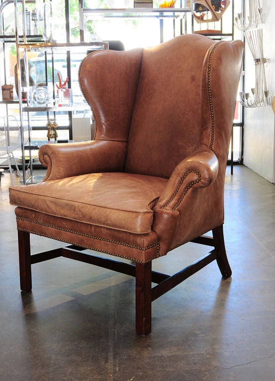 Leather Ralph Lauren Wing back Chair. The Devonshire wing Chair.  Tan Leather.Mahogany base.Nice over sized scale.