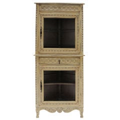 Antique European petite  corner cabinet.