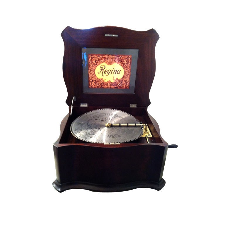Regina music box with 12 disks For Sale