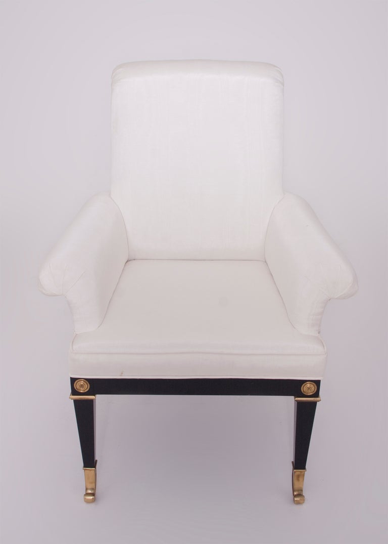 these mastercraft dining chairs are a set of two arm and six side.  They are upholstered in a pure white fabric.  These Empire style chairs have ebonized black and brass bases.  the ornamentation is greek key.  additional measurements: the arm hight