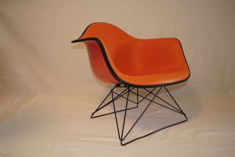 orange eames style chair