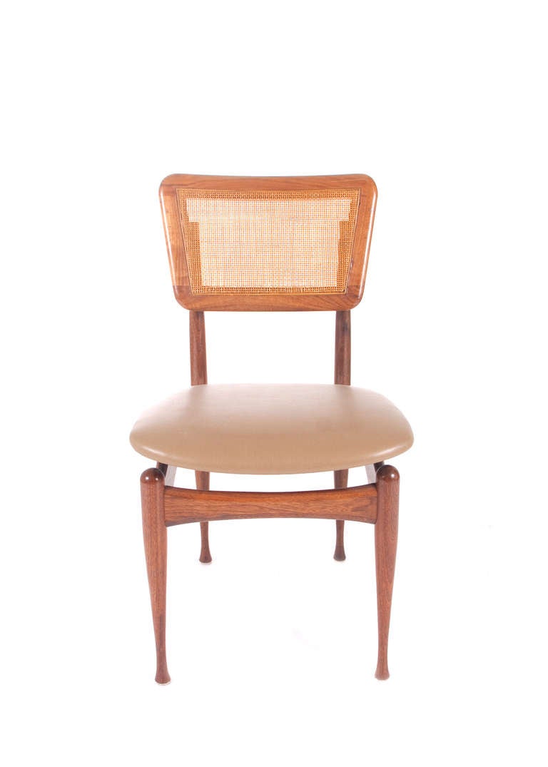 Pair of Thonet Dining Charms with Cane back. Very rare architectural mid-century modern design. Beige leather seats.