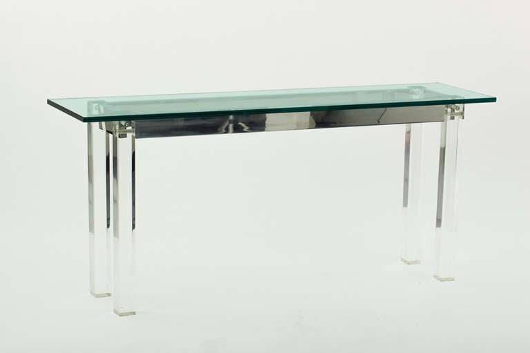 Stunning 1970's console table with lucite and aluminum frame and lucite legs in the style of Charles Hollis Jones.