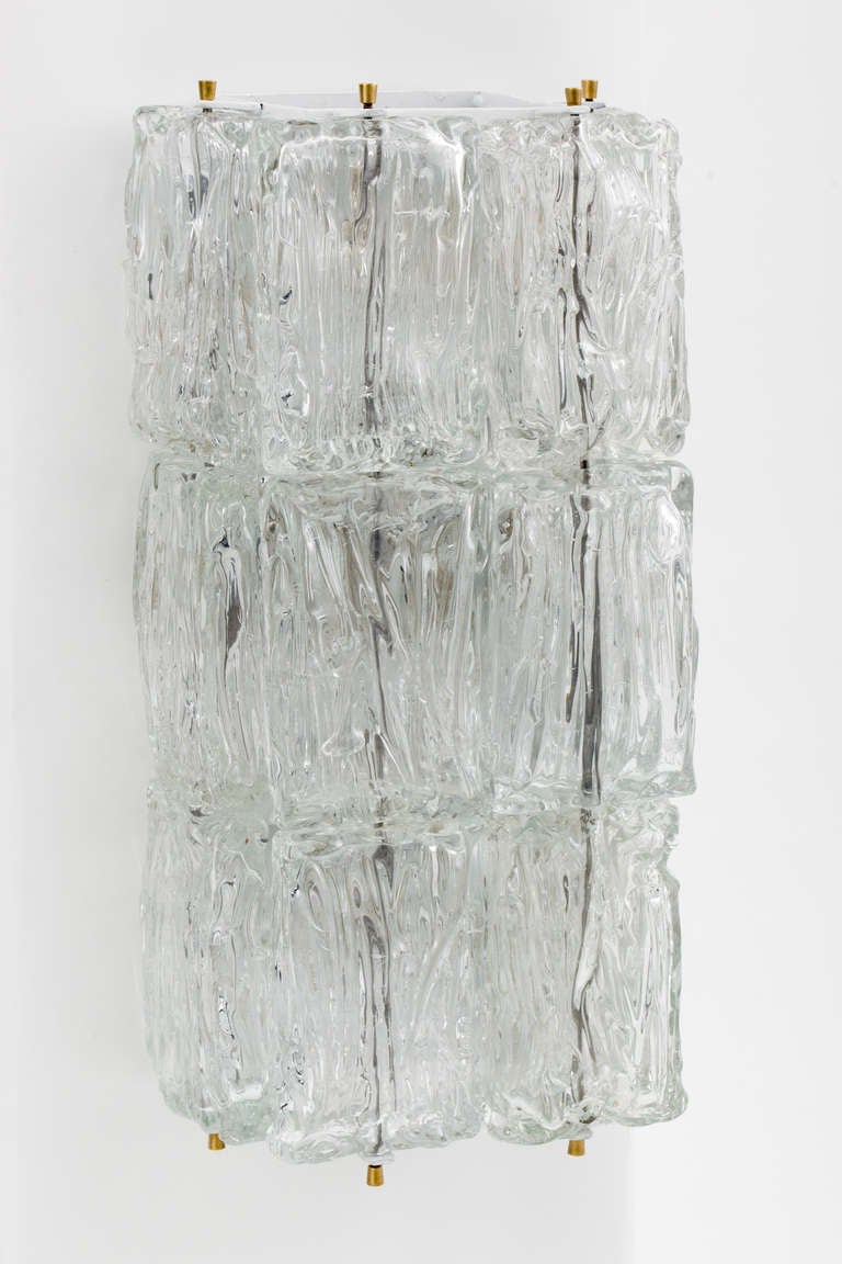 Pair of Venini glass three-tier ice block sconces on metal frame.