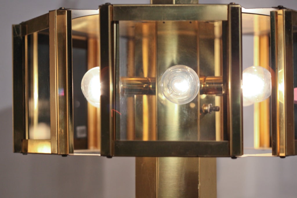 Brass hexagonal six-light windowpane chandelier by Frederick Raymond. May also light single brass spotlight, alone or together with upper lights.