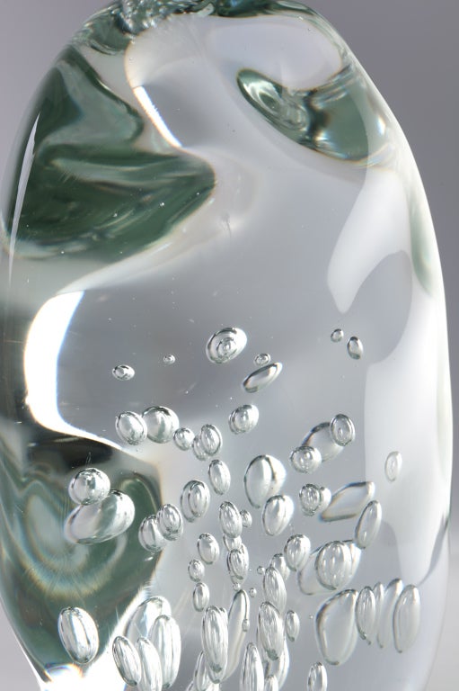 Large amorphic handblown bullicante glass sculpture with air bubble inclusions has unique shape from all angles. Beautiful light reflections throughout.