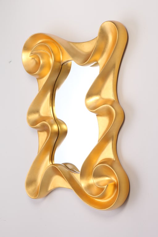 24-Karat gold leaf hand applied on curved cast plaster framed mirror by artist Lawrence De Martino. Signed and dated, 2002. 
This is a rare  original work by the retired artist.