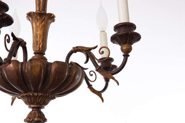 Italian  carved gilt wood six-arm chandelier, with original ceiling cap, circa 1930s.