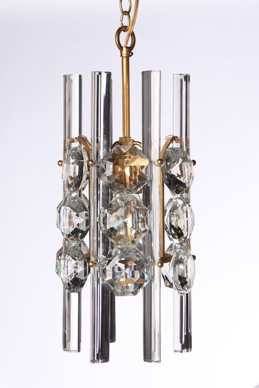 Luscious faceted crystal drop pendant and crystal rod chandelier with gilt brass hardware. Superb craftmanship.