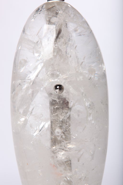 Hand-carved and polished rock crystal teardrop sculpture lamps with nickel-plated brass hardware. 100 watts max per socket.