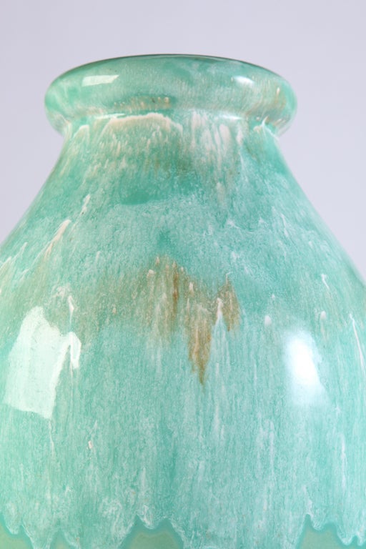 Exquisite sea foam green color and glaze Roseville pottery urn. Signed on bottom.
