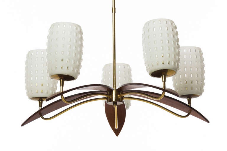 1960s teak petal chandelier with brass frame and five milk glass shades. Foil label marked made in Austria.
