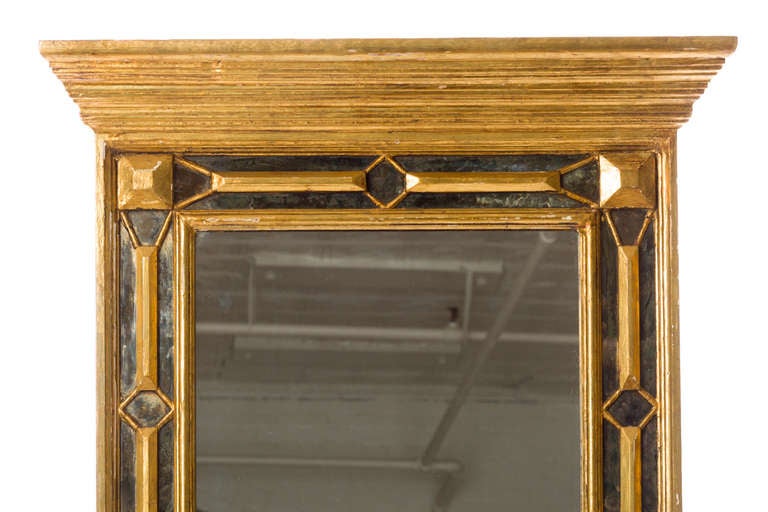 Fine Italian 1950's hand carved gilt wood framed mirror with smoke glass inlay, in the style of Gucci.