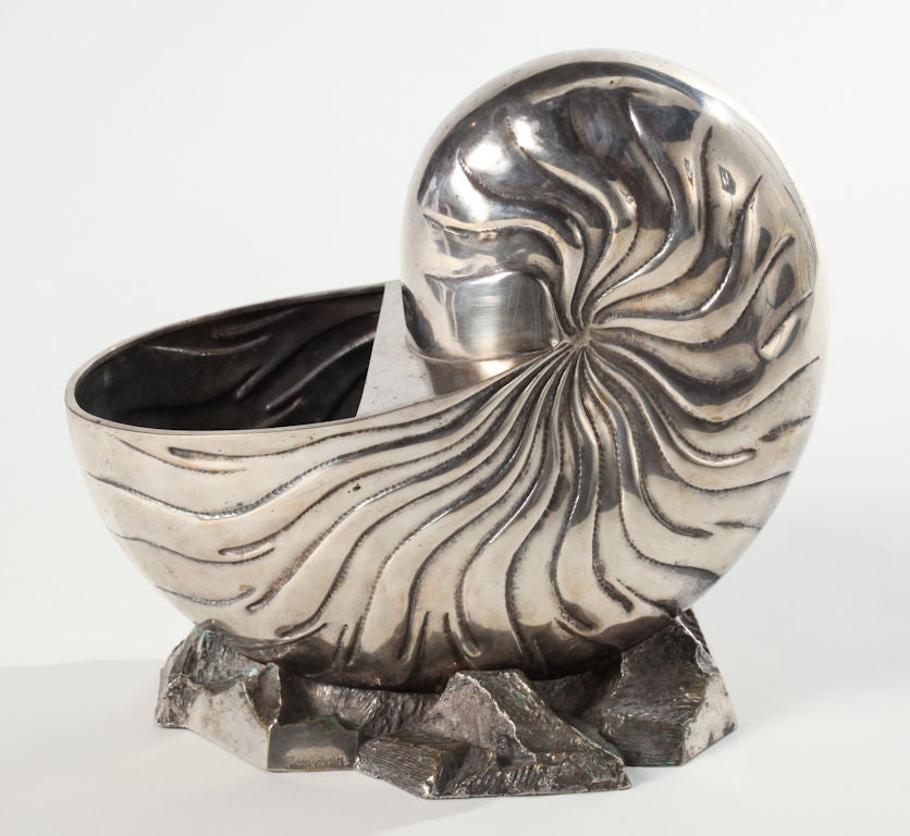 Nautilus shell ice bucket is made of nickeled brass, Signed Leonard Collection.