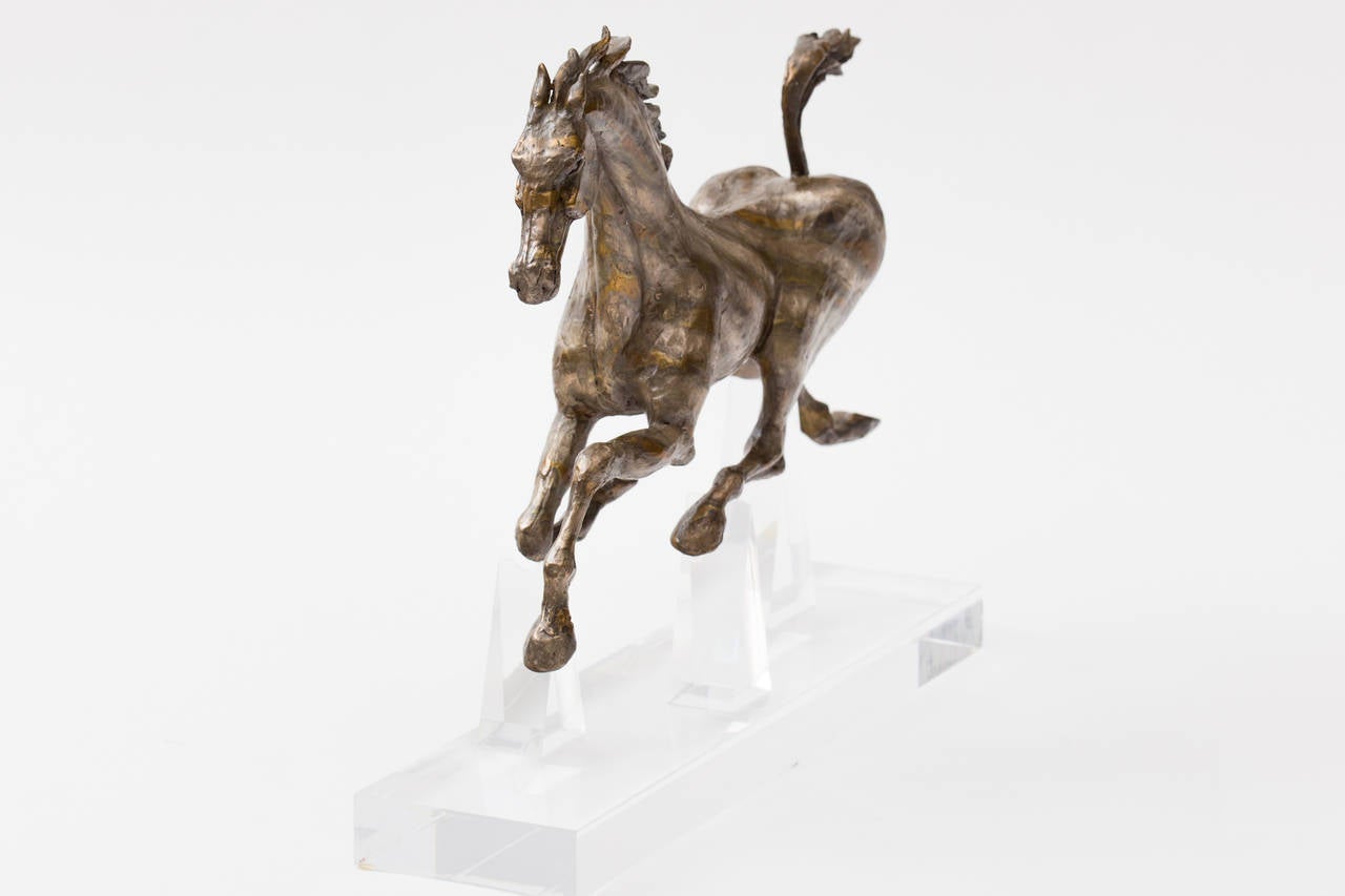 running horse sculptures