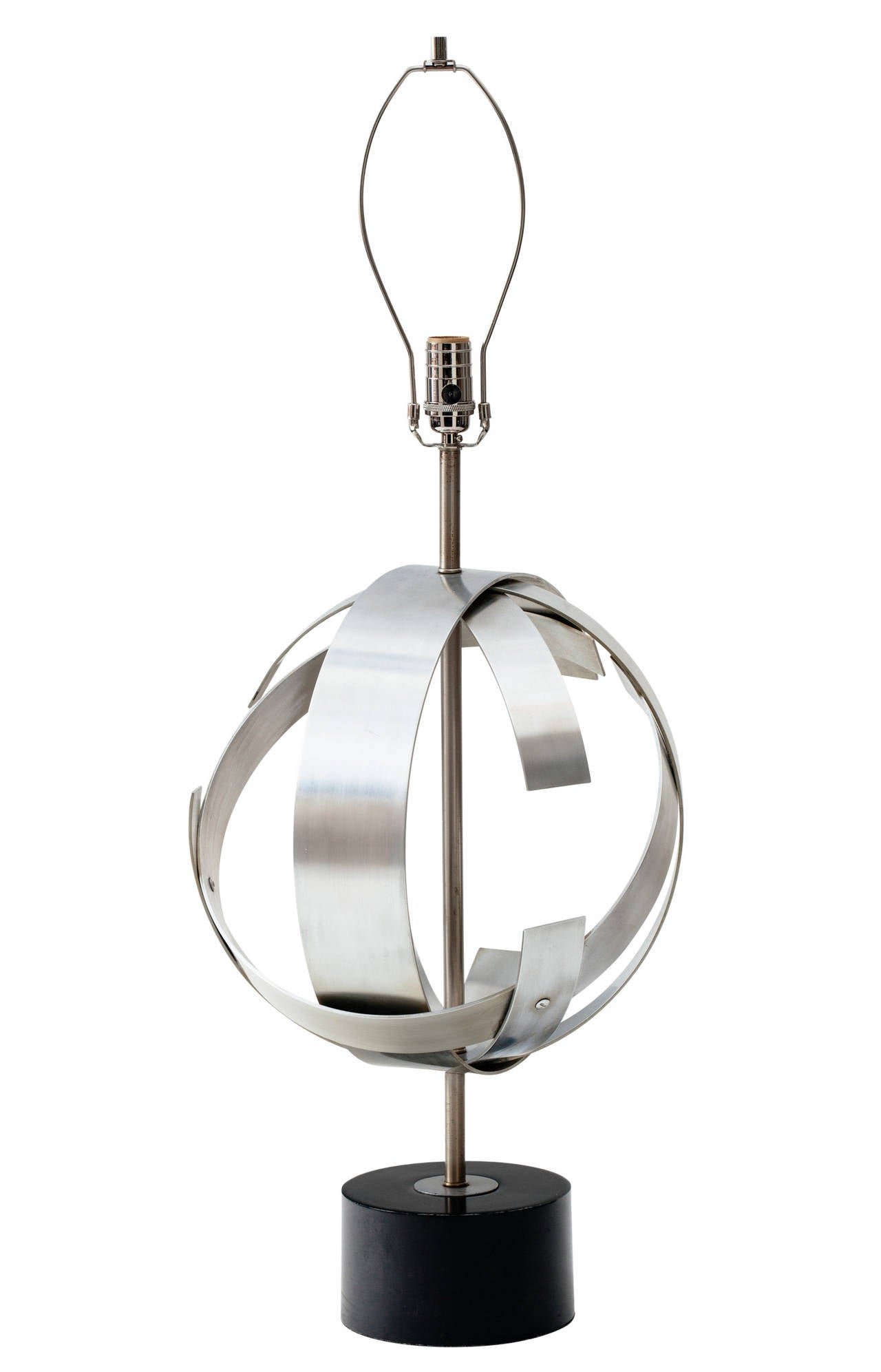  Abstract cut aluminum sphere lamp on circular enameled metal pedestal base, by Laurel Lamp Co., USA, circa 1970.
