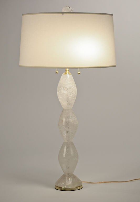 Solid rock crystal diamond shape lamps with rock crystal orb finials.
 Solid brass hardware, with double sockets and pulls, brass bases. 
Also available in polished nickel finish.