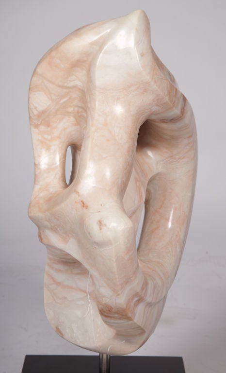 Charles Daidone marble sculpture pivots on steel rod attached to square laminate base. Dated 1976. This sculpture by the artist received awards at various art exhibitions.

 Sculptor Charles Daidone (1921-2009) spent most of his life working on