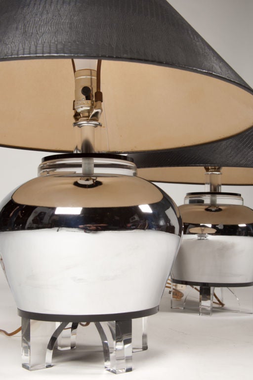 Chrome and Lucite urn lamps with Lucite feet. Height to socket, 15