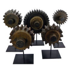 Set of five wooden industrial gear molds