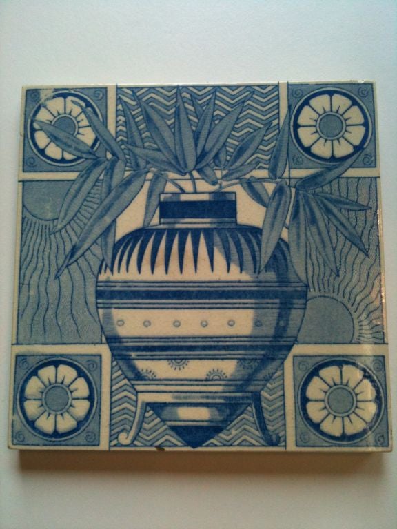 Blue Transfer ware depicts URN on footed base, framed with patera, sun, bamboo and chevron patterns in the manner of Christopher Dresser.