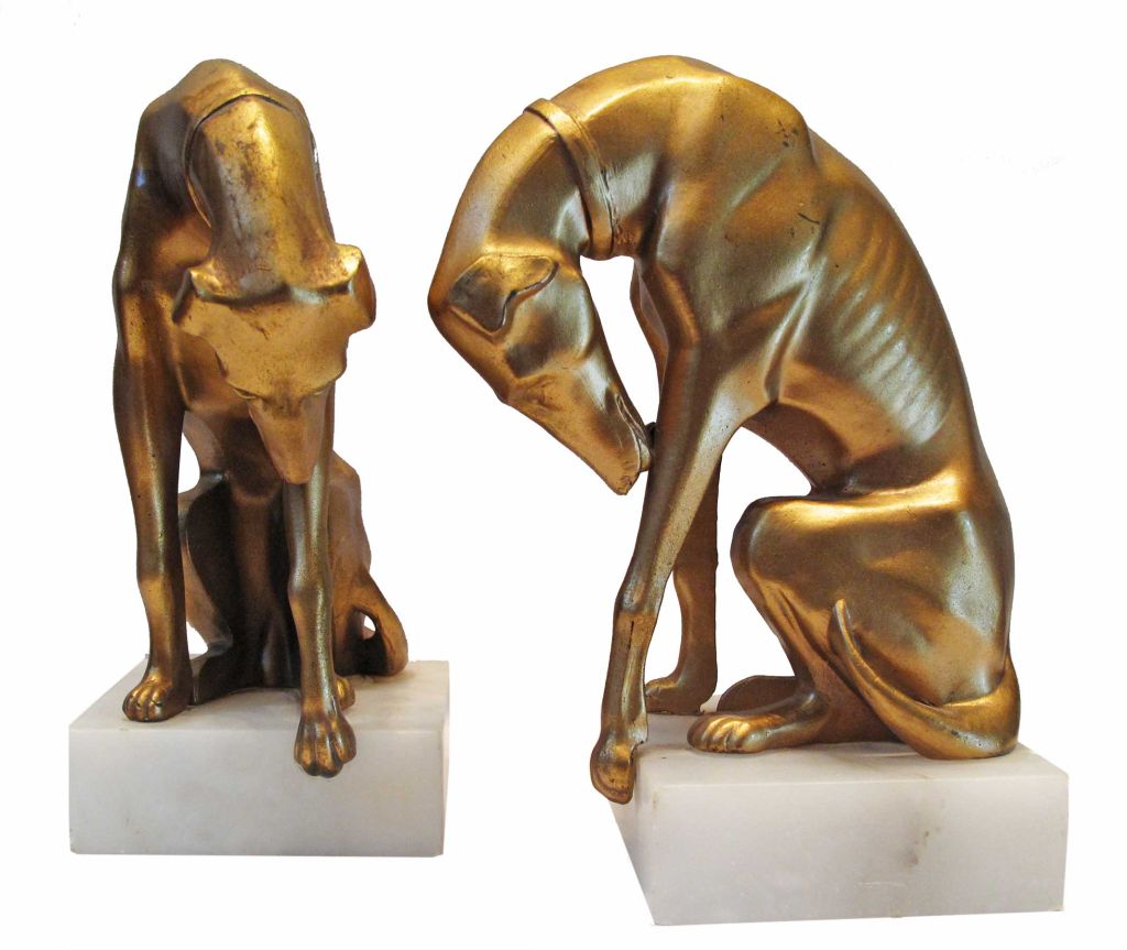 Elegant pair of art deco inspired bookends depicting a pair of greyhounds.