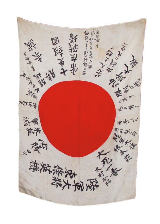 Ink on white silk with red central disc. Beautifully preserved in a custom double glazed frame box - flag is viewable from both sides.  Nineteen manuscript notations in Japanese emanating from central disc, in a pattern reminiscent of the ensign of