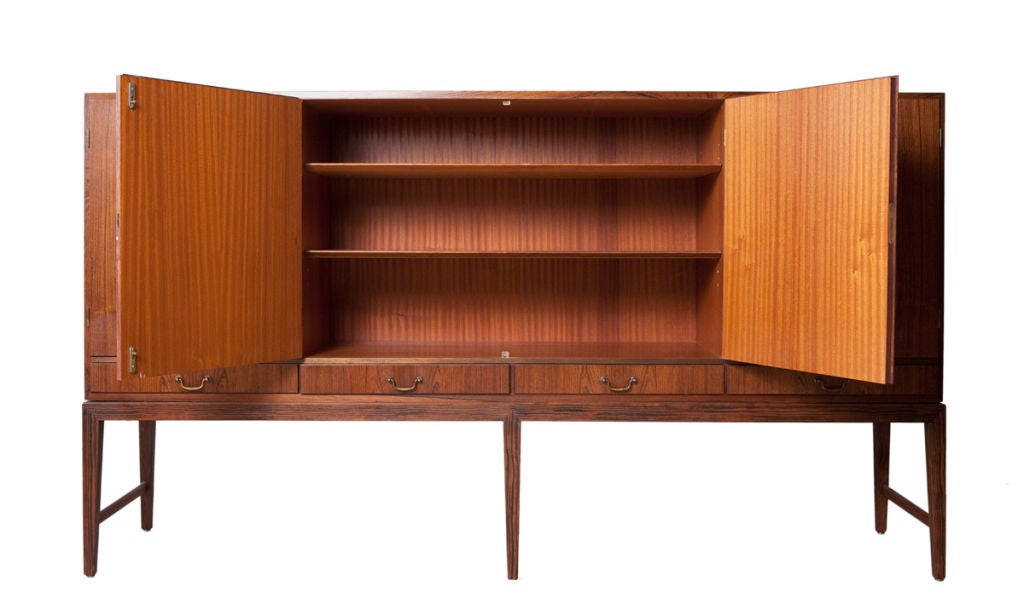 Severin Hansen Jr. rosewood sideboard
Like many Hanson Jr. designs this sideboard has the hallmark features of many of his works as seen in the delicately tapered legs of this serving piece. Mid century Danish modern designers found inspiration in