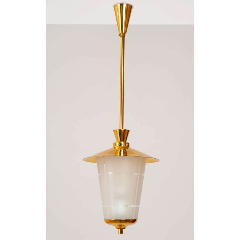 Italy, 1950s.
 
A diminutive elegant lantern.
Polished, perforated brass mounts; frosted and etched glass shade.
 
Measures: 10 Ø x 12 H body / 27 H with shaft.

Rewired for use in the U.S.A.