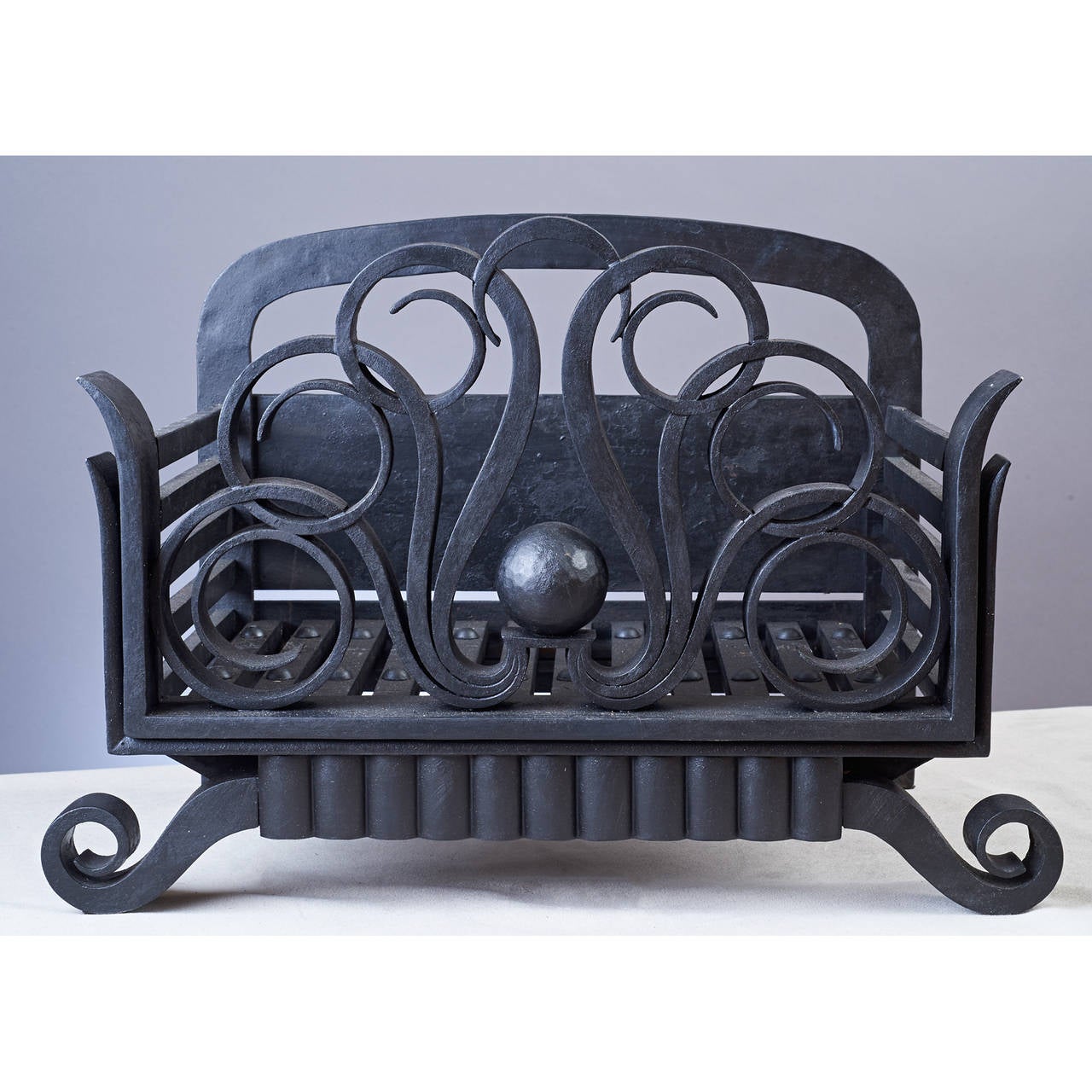 Art Deco Wrought Iron Log Carrier in the Manner of Raymond Subes, 1930s