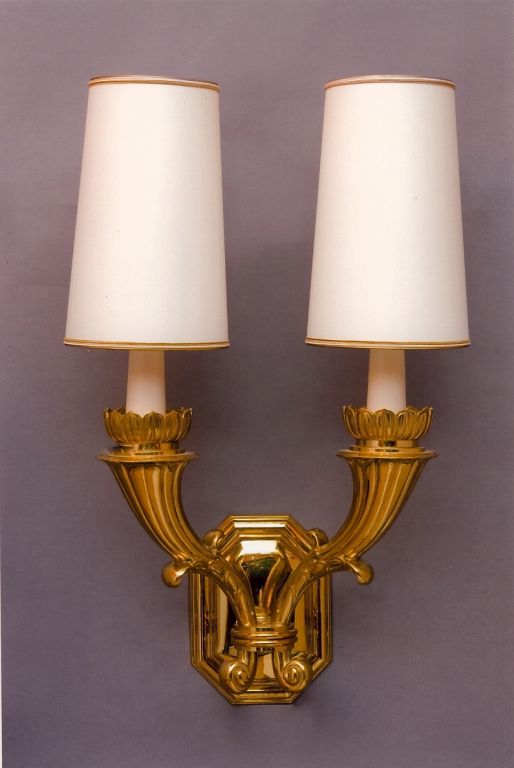 Italy, 1930s
A magnificent pair of two-branch neoclassical bronze sconces.
Rewired for use in the U.S.
Dimensions: 34 H x 21 W x 14 projection.
Priced and sold as a pair