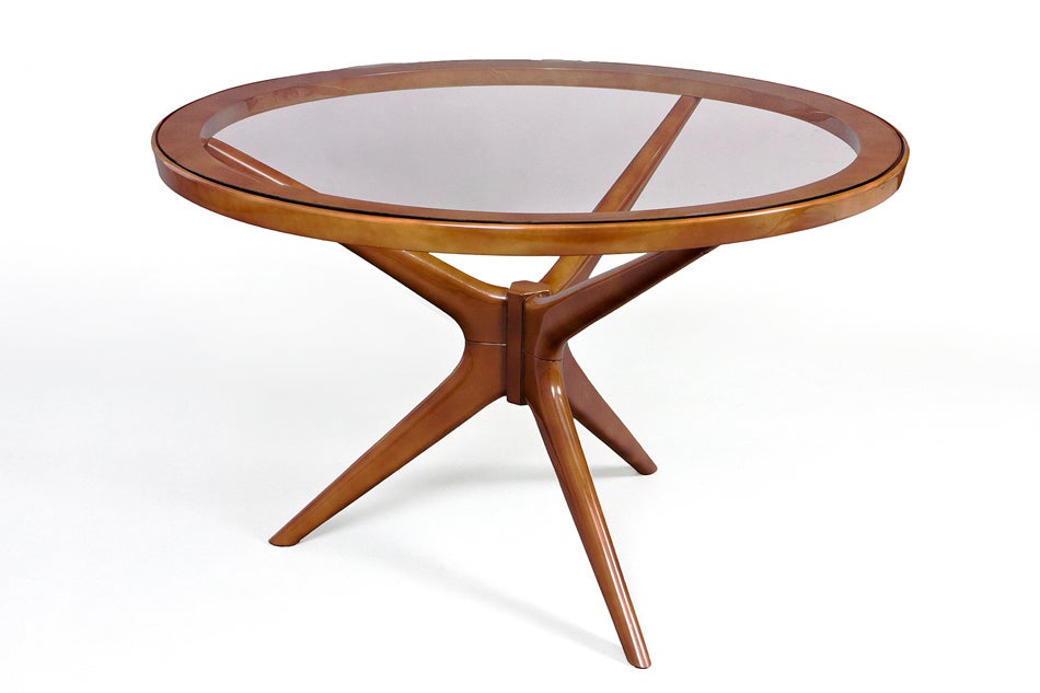 France, 1950s
Round dining or center table in mottled lacquer in shades of brown by Sain et Tambute.
Please note the glass is clear, not smoked.
47 Ø x 30 H.