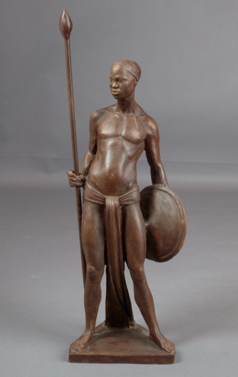 Arthur Dupagne, in the style of
handsome sculpture of African warrior in patinated resin,
Belgium, 1950s
Measure: 30 H.