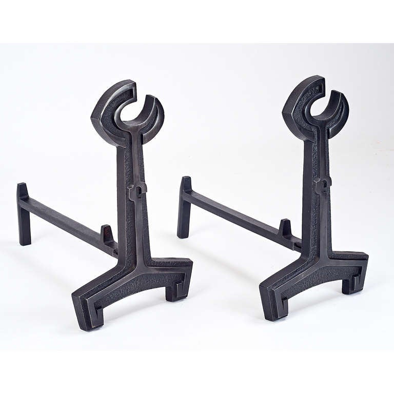 Pair of modernist cast iron andirons.
France, 1950s.
Dimensions: 10 W x 16 H x 17 D.