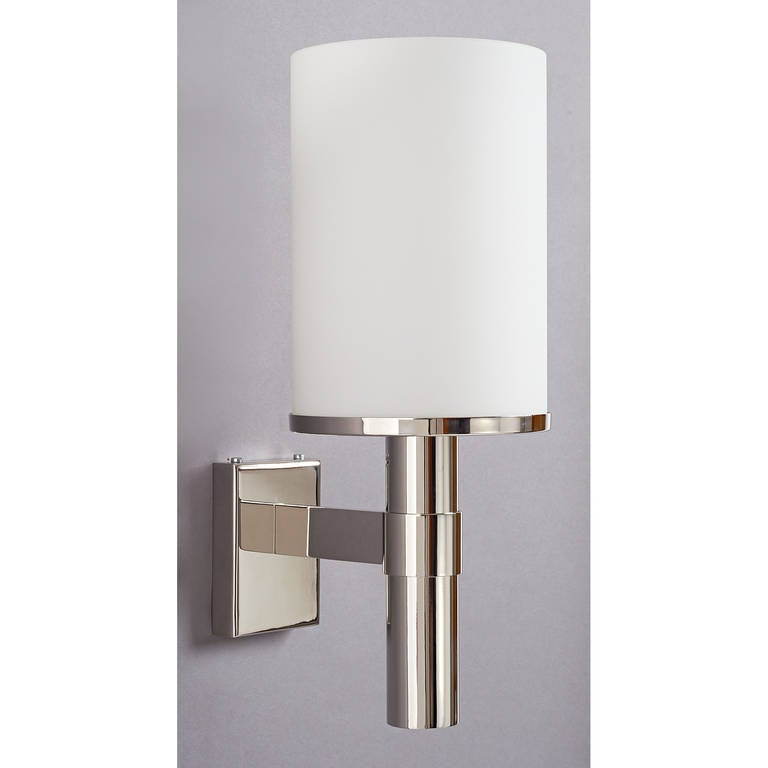 Jean Perzel (1892-1986)

Pair of nickeled brass sconces with cylindrical white glass shade
Signed
France, 1950s

5.5 W x 14 H x 8 Proj.

Rewired for use in the U.S.