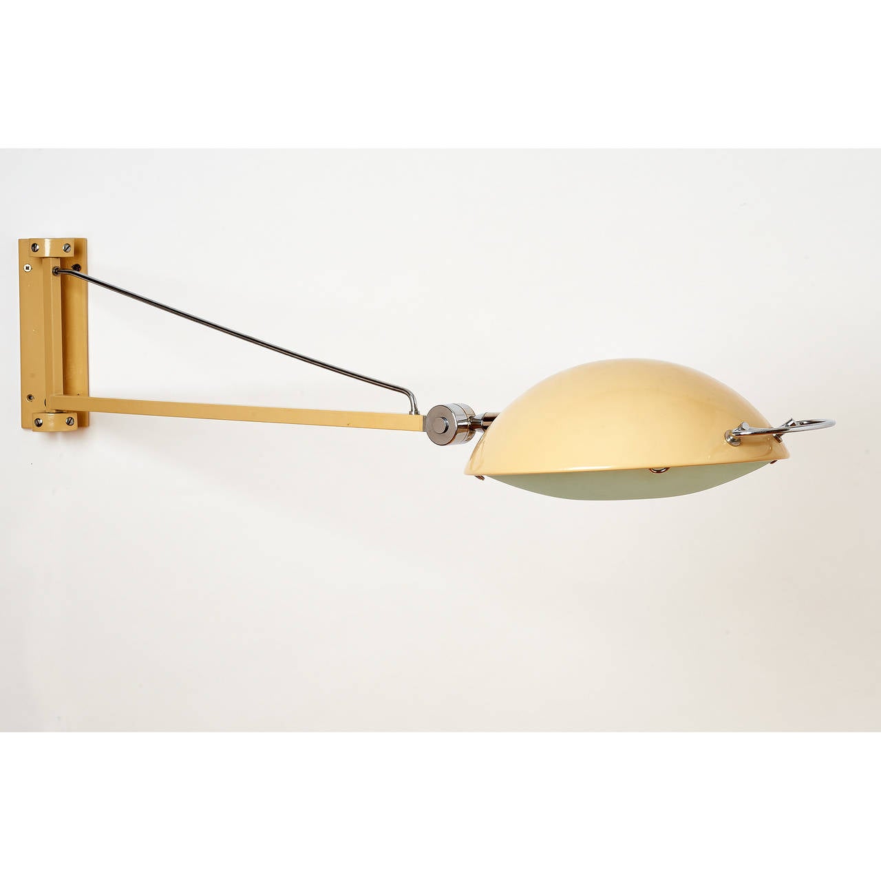 Stilnovo.
Adjusting swing arm sconces.
Enameled metal with glass shade and nickel mounts.
Signed,
Italy, 1950s.

37 long x 11 diameter. Backplate: 8 x 2.5

Rewired for use in the U.S. with one standard base bulb.
