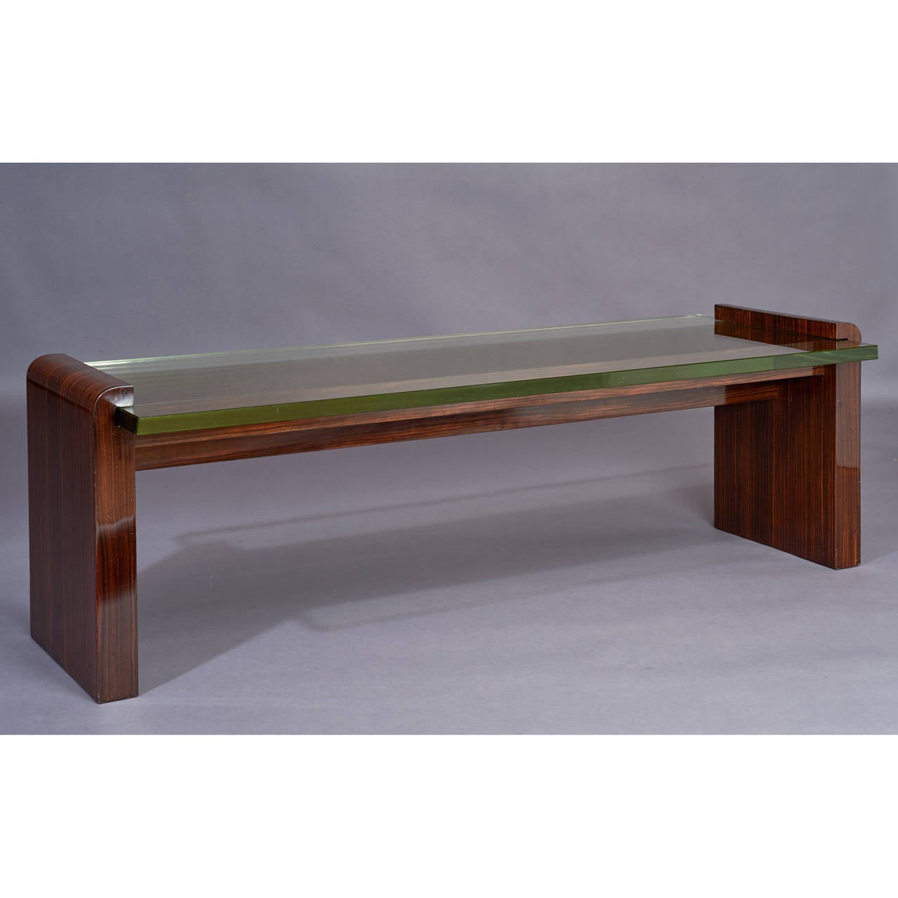 Important 1930s Macassar Ebony and Glass Coffee Table by Jacques Adnet In Excellent Condition In New York, NY