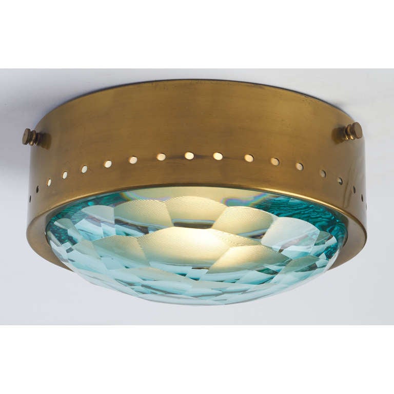 Fontana Arte, att. to,

Small ceiling light fixture, the frame in  perforated patinated brass , the faceted lens, backed by textured glass, att. to Fontana Arte.
Italy, 1950's

7.5 Ø x 4 H

Rewired for use in the U.S.

On view at our