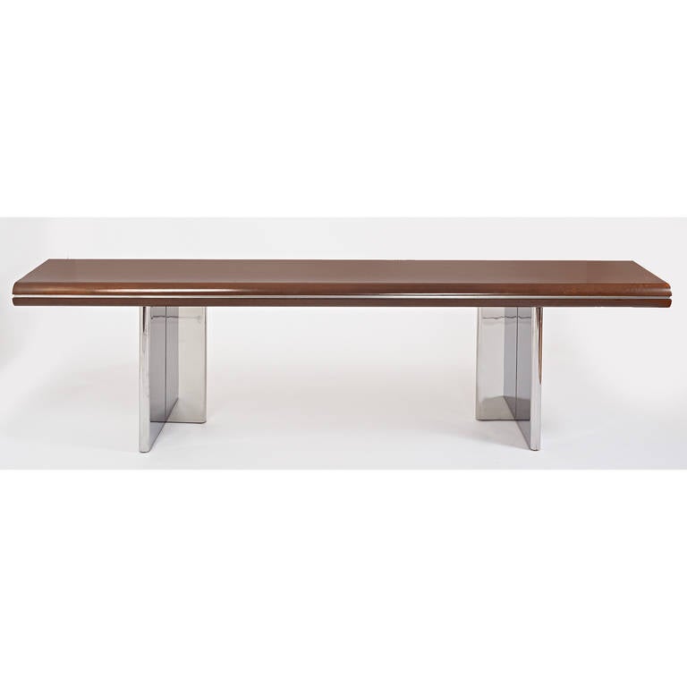 Hans Von Klier (1934-2000) for Skipper.
Long ten foot walnut console with rounded edge, mounted on polished steel L form legs,
Italy, 1970s.
Dimensions: 118 x 20 x 28.5 H.