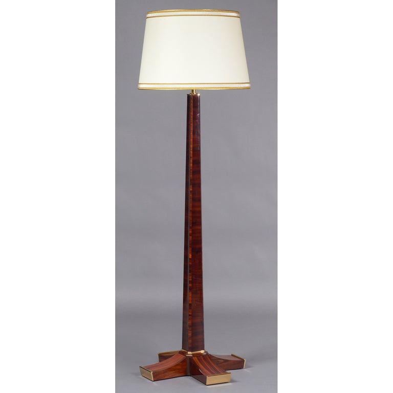 France, 1930s.
An extraordinary floor lamp in polished wood with exceptional gilt bronze mounts, attributed to Lucien Rollin.
Dimensions: 22 diameter x 71 H.
Rewired for use in the U.S.A. with two standard base bulbs.